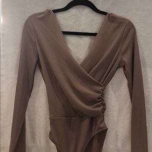 Beige long sleeve twist bodysuit